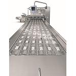 Foto de La nueva termoformadora Multivac R 685 procesa láminas muy anchas para un gran volumen de mercancía ya cortada