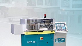 Picture of 'Big machines - compact design', Boy slogan in the K 2010