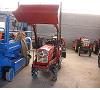 Mini tractor con pala cargadora Foto
