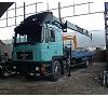 Man 372 cv con Grúa Foto