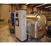Autoclave automático SURDRY de 4 cestas Foto