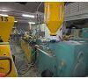Line of extrusion of profiles P.V.C. With extruder AMUT. Foto