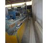 Line of extrusion of profiles P.V.C. Extruder FLAG/COVEMA. Foto