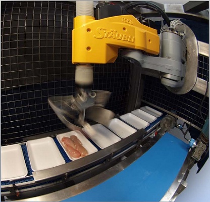 Foto de Robots para la carga de pechugas de pollo