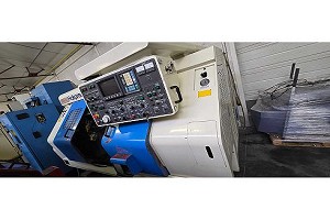 NAKAMURA TOME TW20 MM torno CNC de doble husillo con herramientas motorizadas y carga por p�rtico