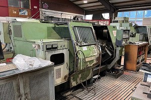 Torno CNC OKUMA LC20-2 piezas de 1980