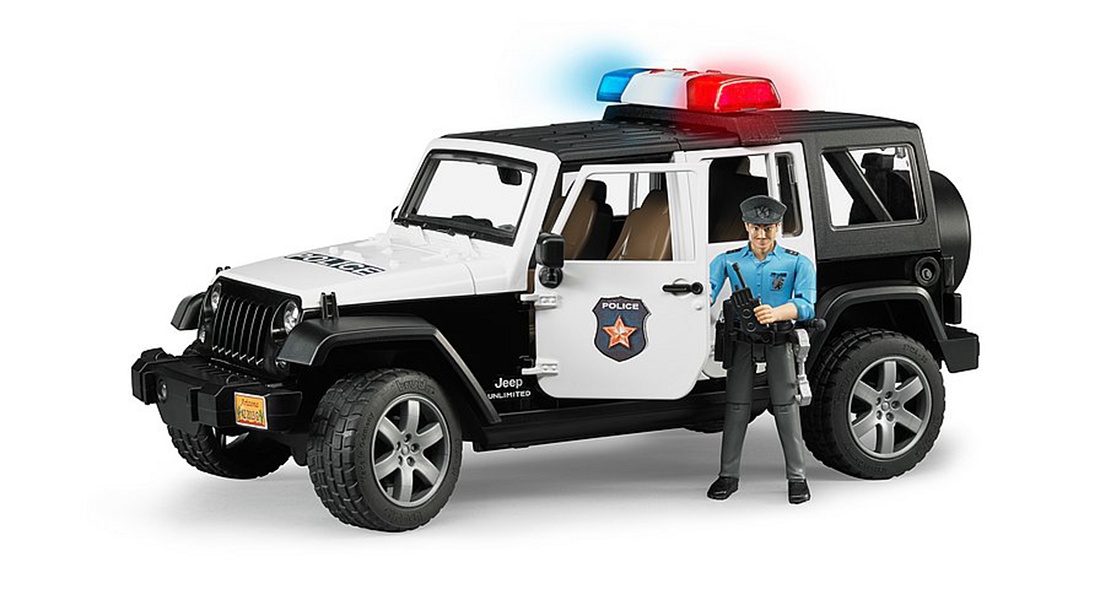 Foto de Vehículo policial con policía y equipo de juguete