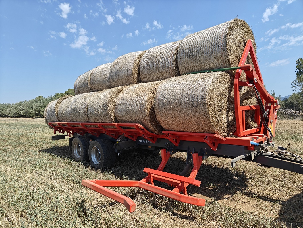 Foto deRemolque autocargador basculante