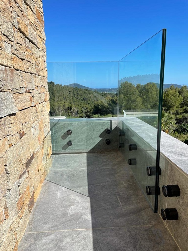 Foto deBotones de fijación para barandillas de vidrio