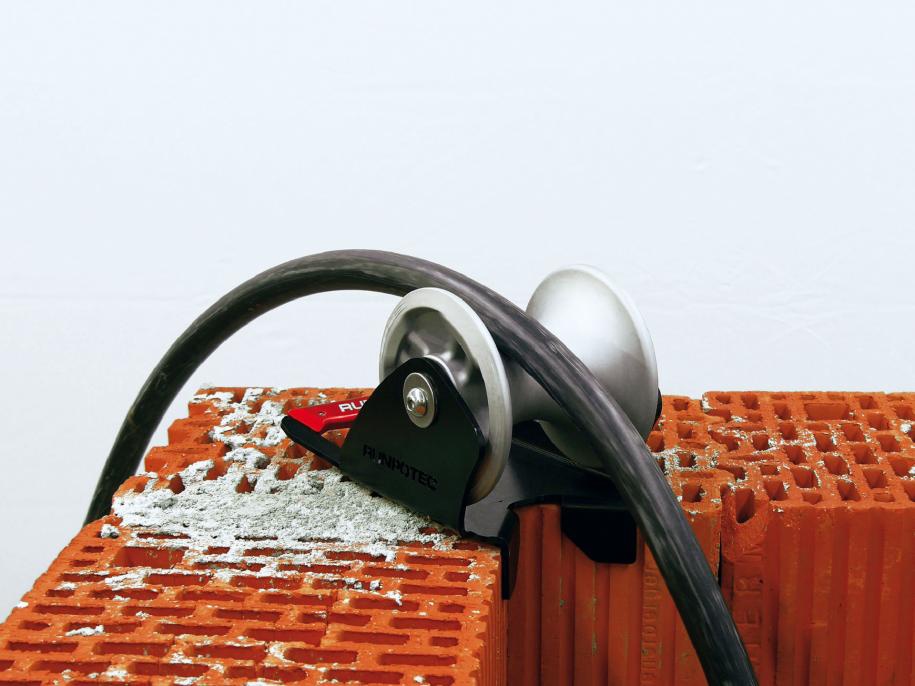 Foto deRodillos de guía de cables para los bordes interiores de los huecos