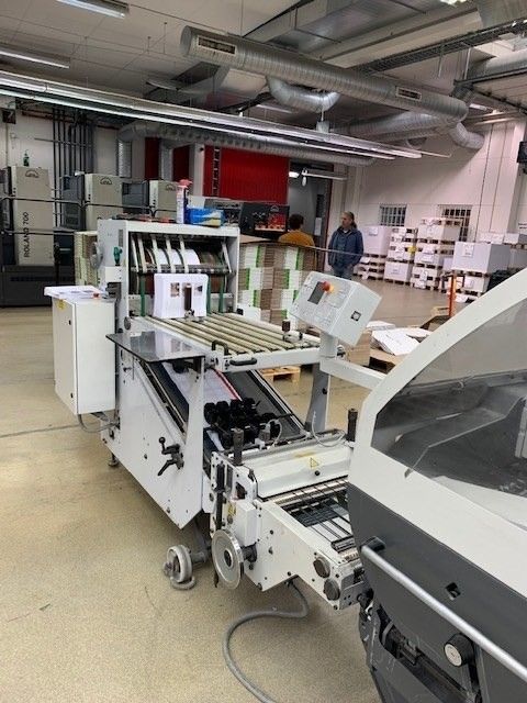 salida vertical con unidad de prensado