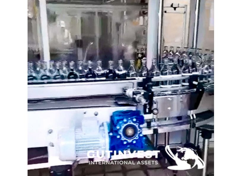 Llenadora de botellas de vidrio. Capacidad 10.000 bot./hora