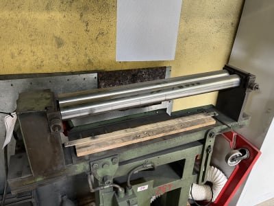 Sheet metal bending machine