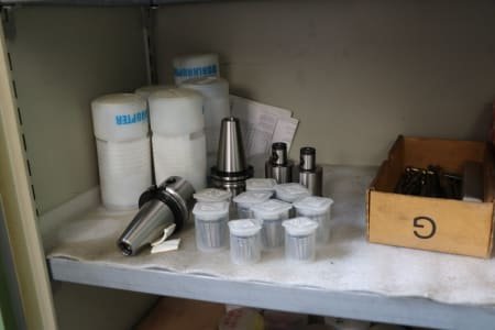 Double-door workshop cabinet with contents
