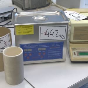 Ceramic container/ultrasonic cleaner/densitometer with direct display