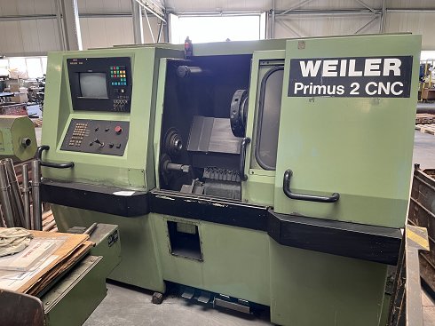 Torno CNC con cargador de barras WEILER Primus 2