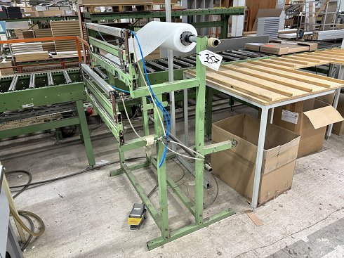 Roll dispenser with pneumatic cutting device