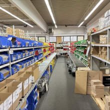 Packaging area with roller conveyor and shelves (without contents!)