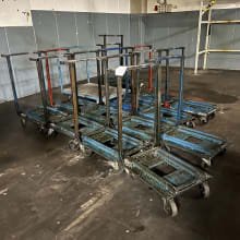 Lot transport trolleys for steel baskets