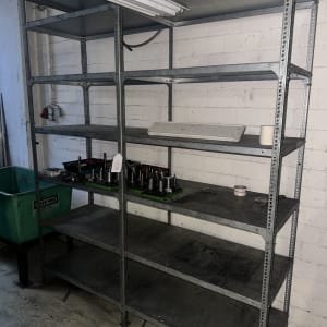 Workshop shelving with contents