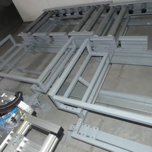 PLC 2 pcs. Cross conveyor roller tables for robot loading