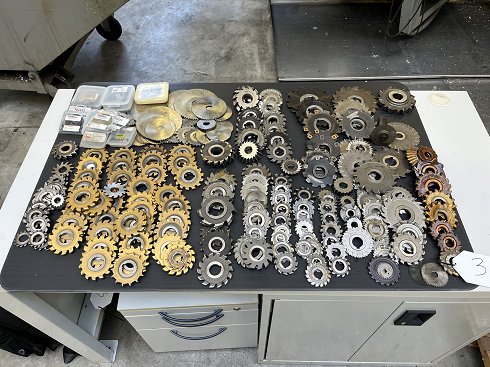 Lot disc cutters and slot cutters