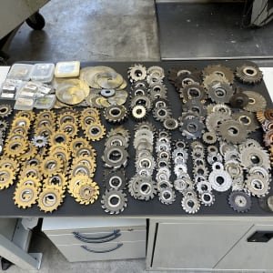 Lot disc cutters and slot cutters