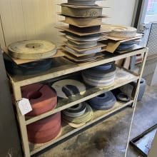 Lot grinding discs on shelf