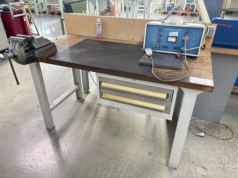 Workbench with vice and contents