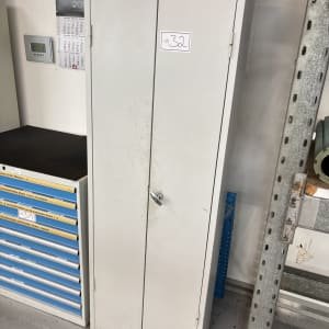 Hinged door cabinet with contents