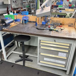 Workbench with vice and contents