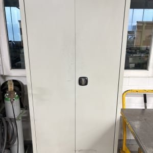 Hinged door cabinet with contents