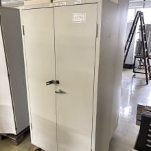 2 hinged door cabinets with contents