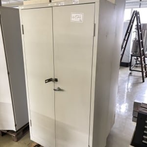 2 hinged door cabinets with contents