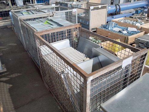 3 pallet cages and 1 pallet with contents