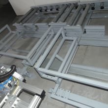 PLC 2 pcs. Cross conveyor roller tables for robot loading