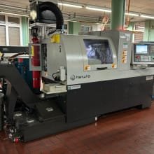 Torno tipo suizo CNC con transportador de viruta HANWHA XD 20II-V