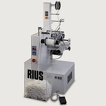 Mquina enrolladora y medidora en carretes