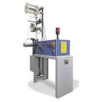 Mquina enrolladora y medidora en cartn