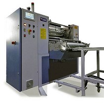 Mquina cortadora y dobladora para la produccin de compresas