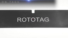 Roto Tag - Laser marking center with Z axis, 8-station rotary table, and fiber optic laser