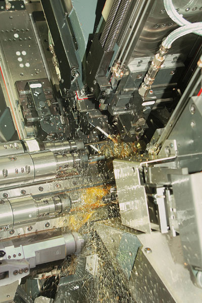 Image of the workspace of a machine of multi-head automated the Swiss specialist in tornos lathes...