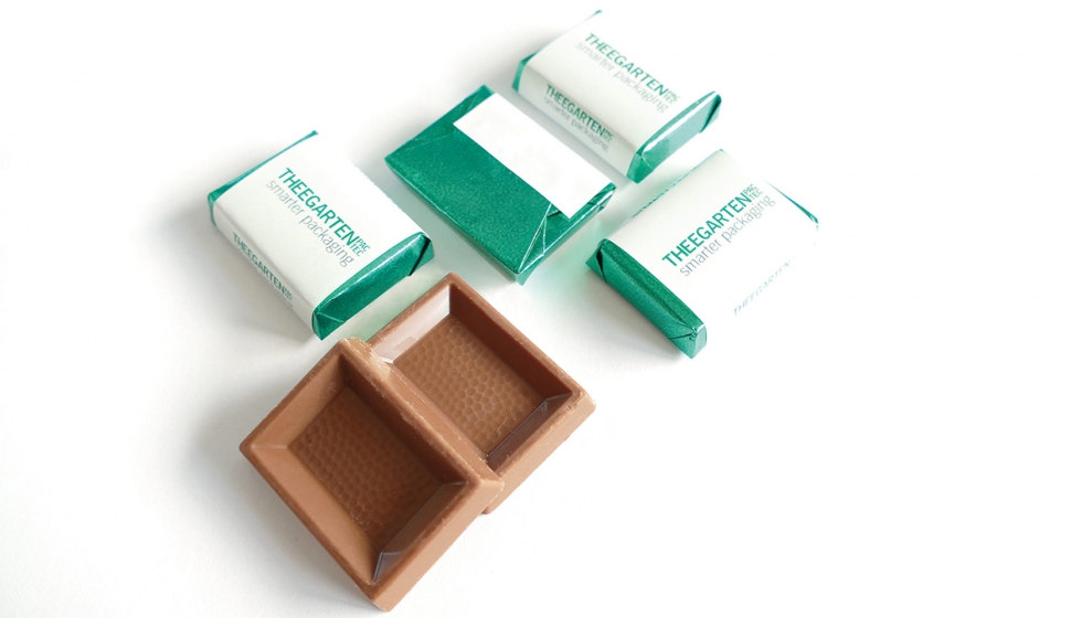 En ProSweets, una mquina demuestra el embalaje de tabletas de chocolate pequeas en doblado tipo sobre con precinto. Imgenes: Theegarten-Pactec...