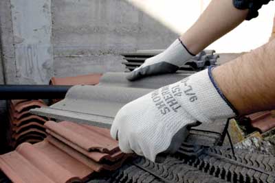 Thomas Bodero offers special gloves to protect the hands of the construction workers