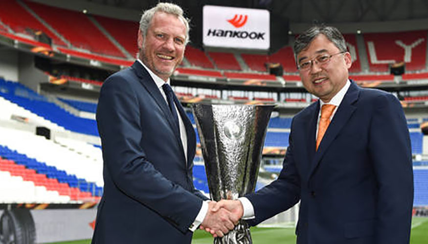 Guy-Laurent Epstein, UEFA Marketing Director, Han-Jun Kim, President, Hankook Tire Europe