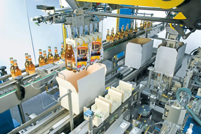 The flexible top-loading machines allow packing the packs directly into boxes for transport...