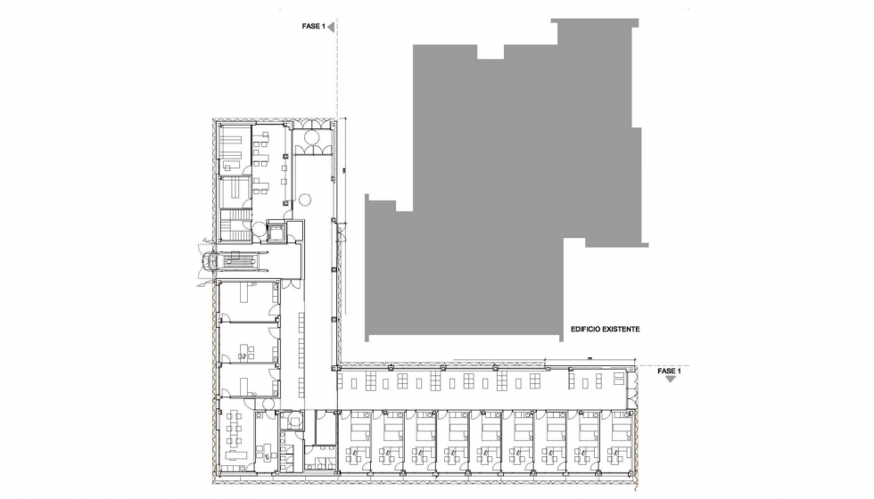 Imagen del edificio fase I conviviendo con el existente