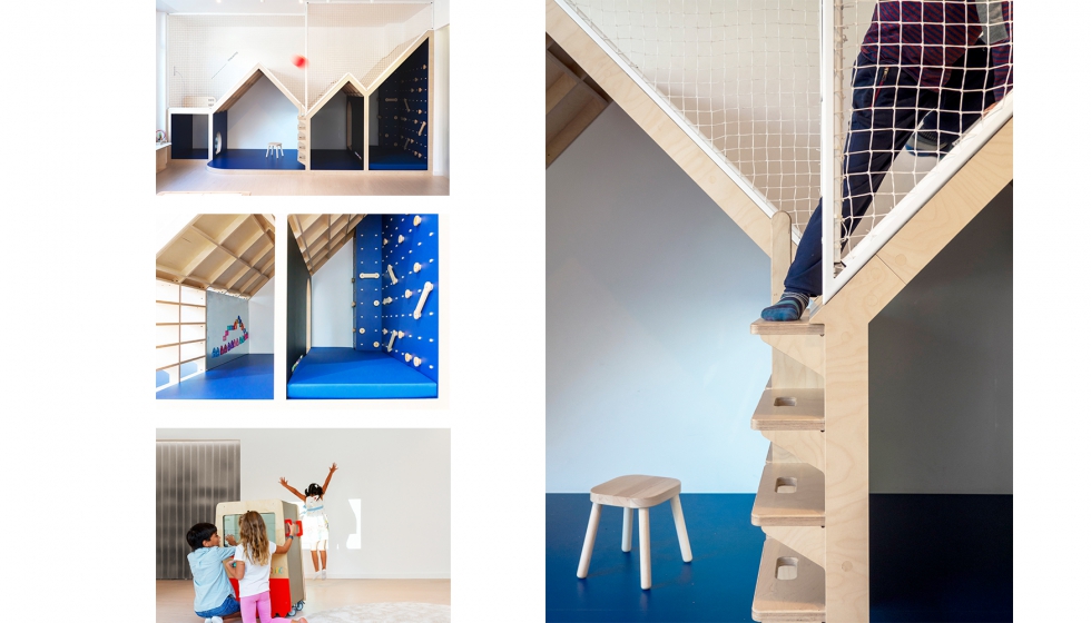Dentro del espacio infantil, se han construido casas de madera cuyas paredes, suelos y techos estn baados en azul marino...