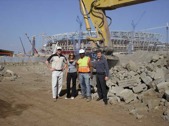 Guido Azzolin (first right), in the works of construction of the stadium in Johannesburg