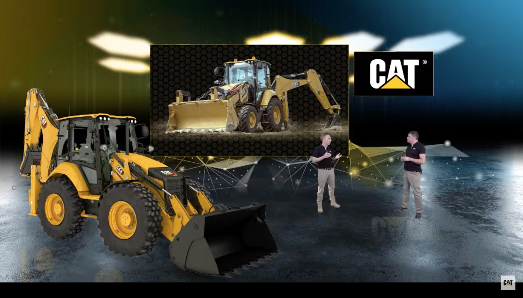 Richard Maddocks (izquierda), Product Specialist en Caterpillar Inc., fue el encargado de presentar las nuevas retropalas Cat...